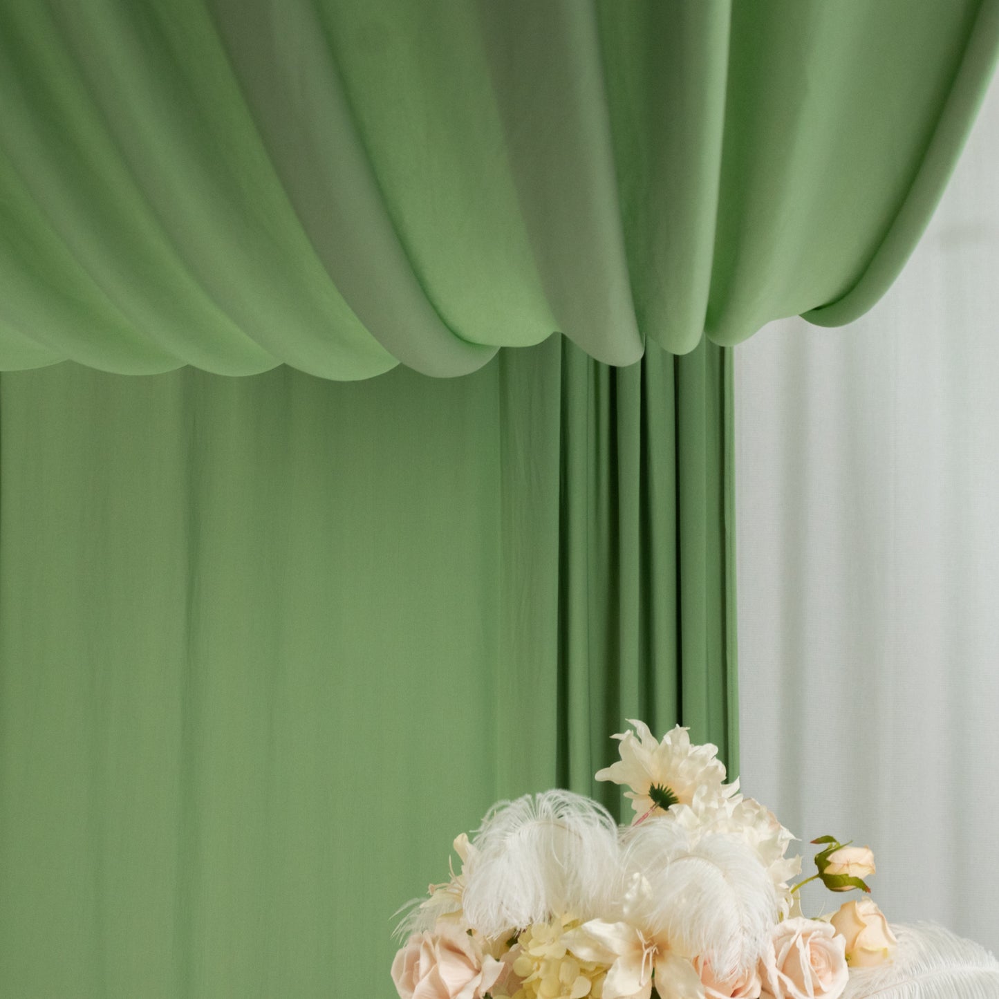 Sage green 4-way stretch spandex event curtain drapes with rod pockets.