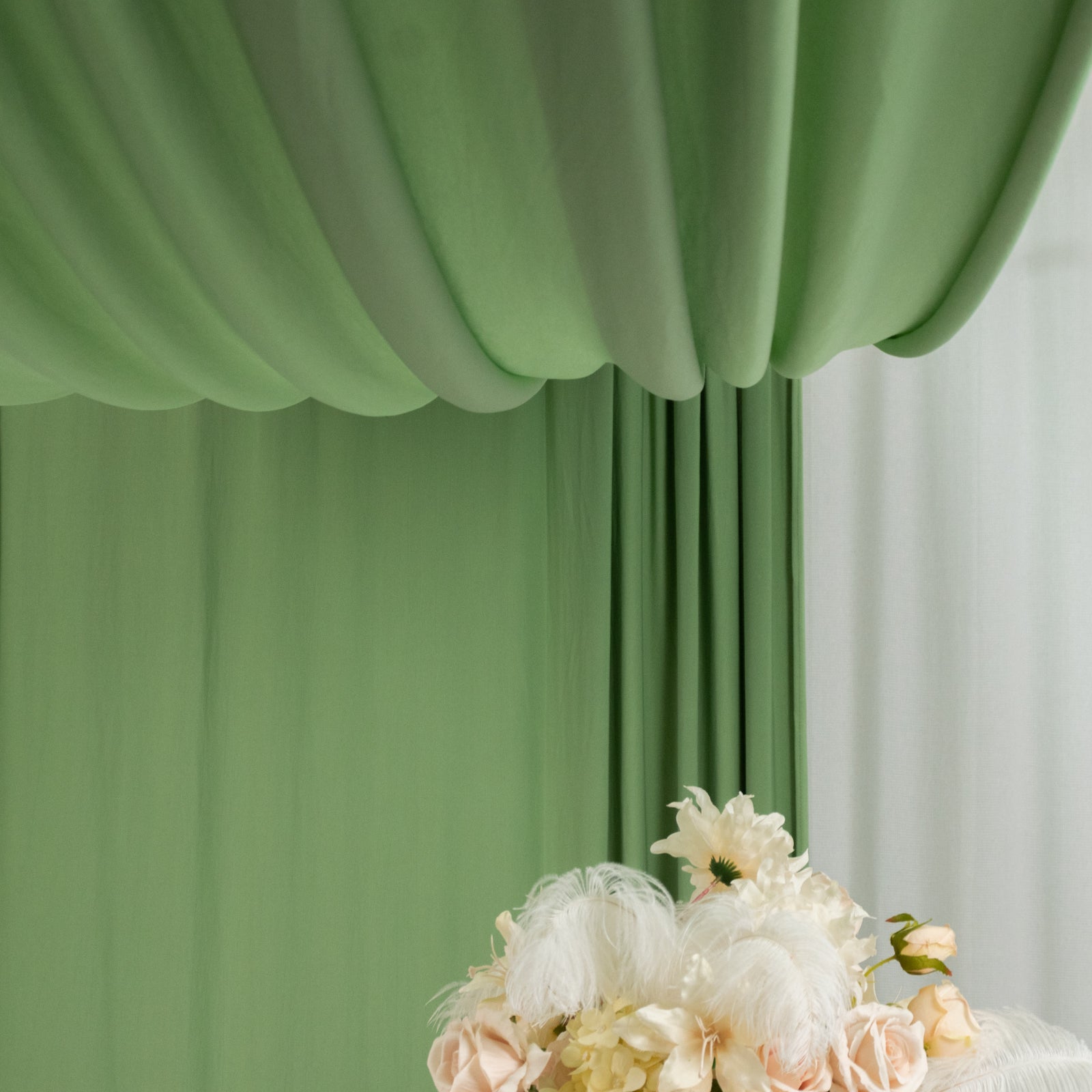 Sage green 4-way stretch spandex event curtain drapes with rod pockets.