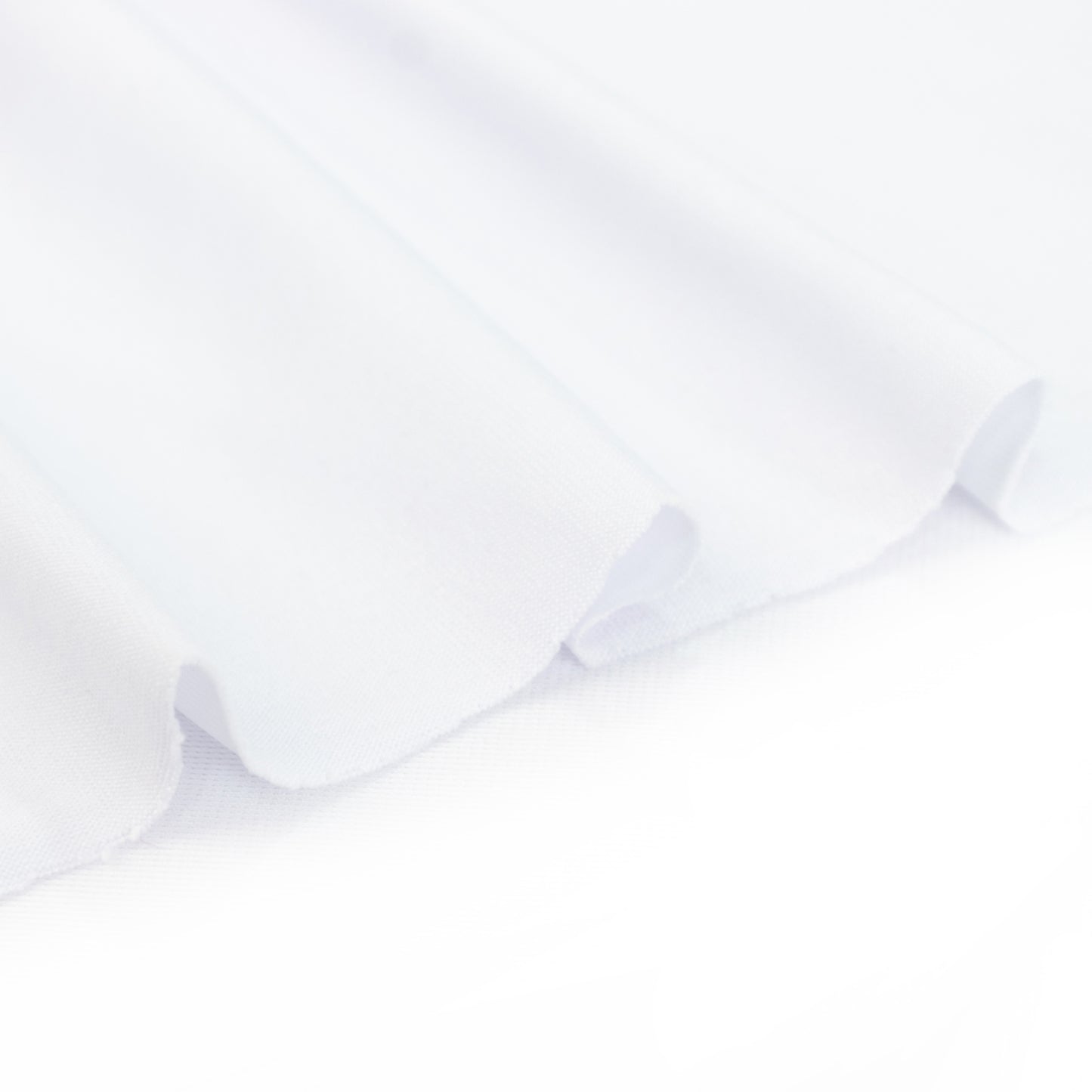 White stretch spandex tent ceiling drape fabric with pole pockets.
