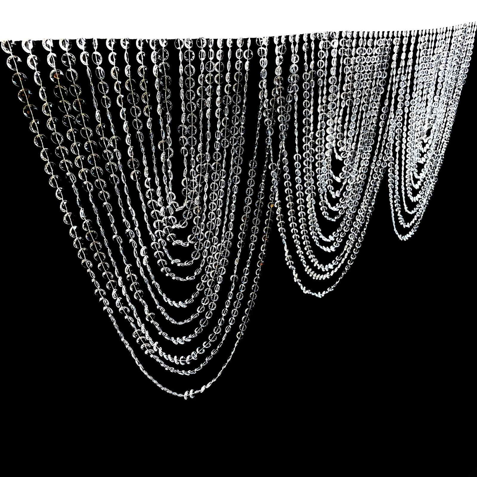 Crystal beaded curtain valance in clear acrylic, 23"x42", triple swag design.
