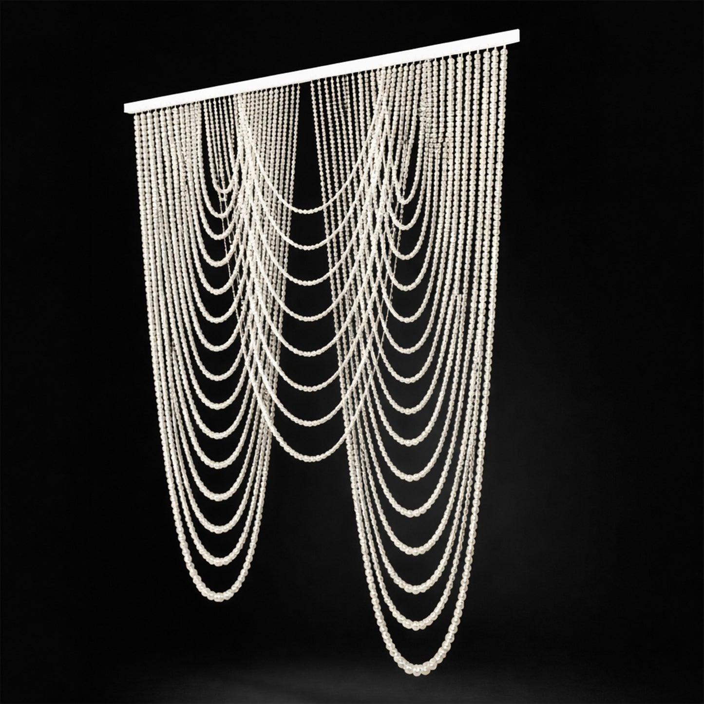 White faux pearl beaded curtain swag backdrop for doorway or wall decor.