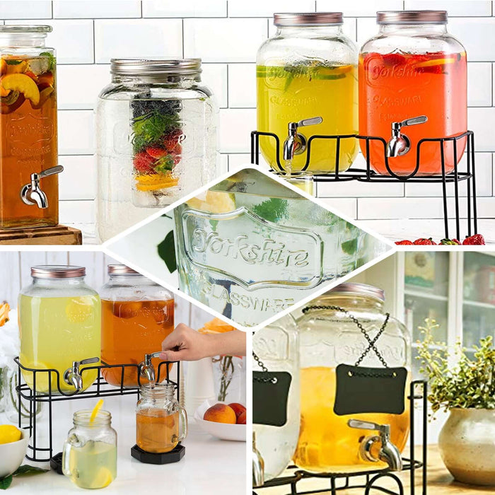 Clear dual gallon glass jars dispenser with rose gold lids, featuring beverages.