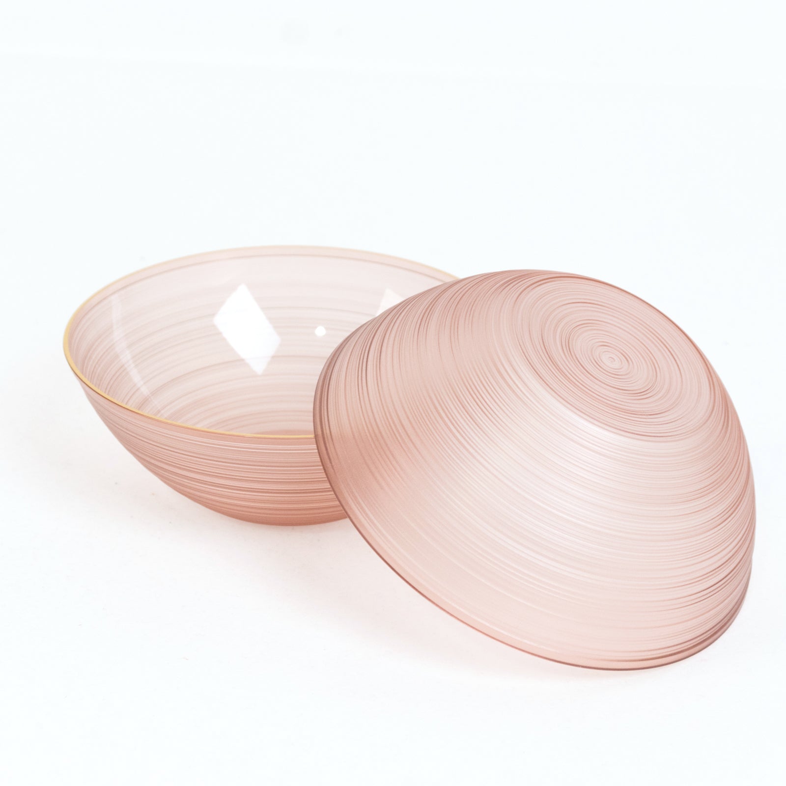 Transparent dusty rose disposable bowl with gold rim, elegant crystal-like swirl design.
