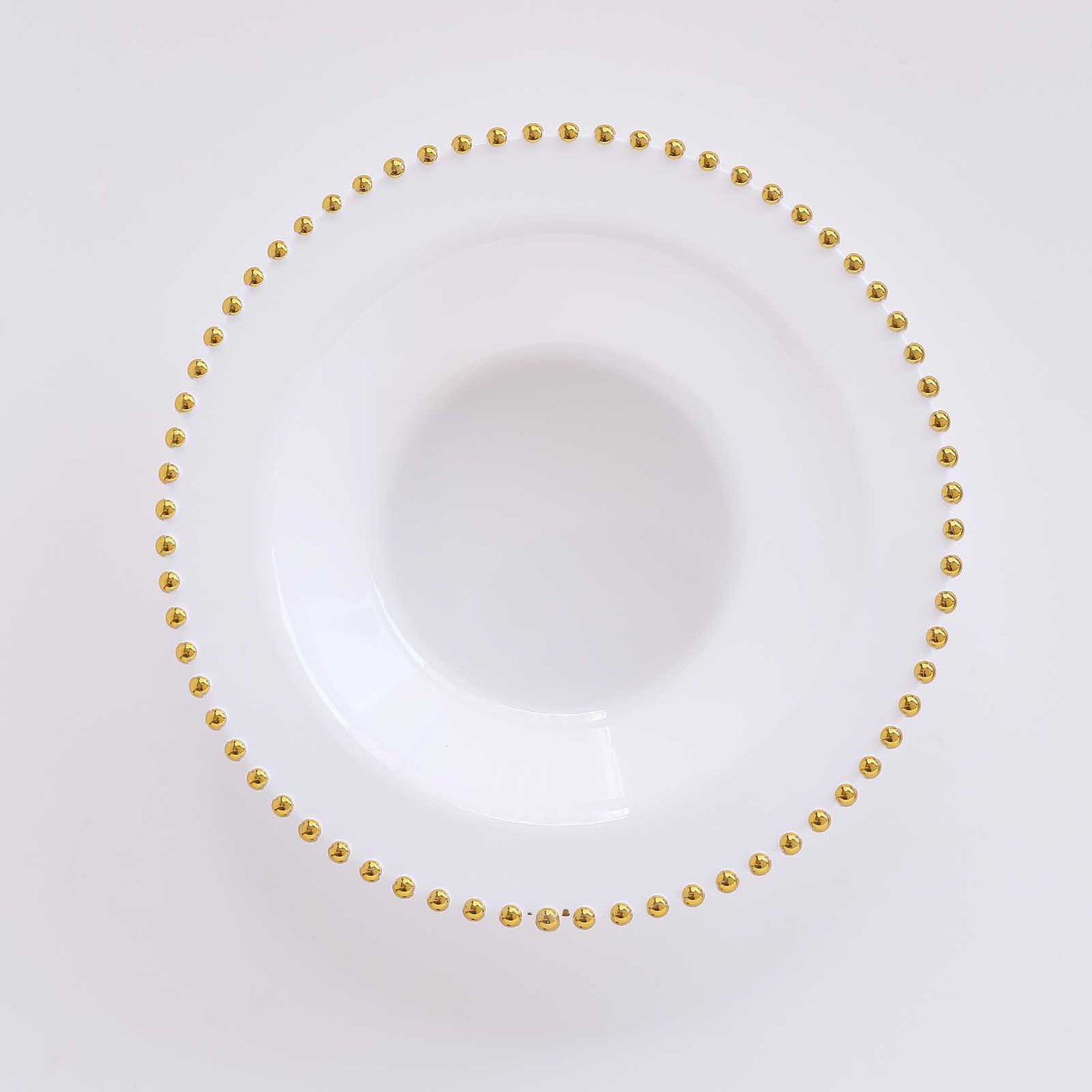 White round plastic dessert bowl with gold beaded rim.