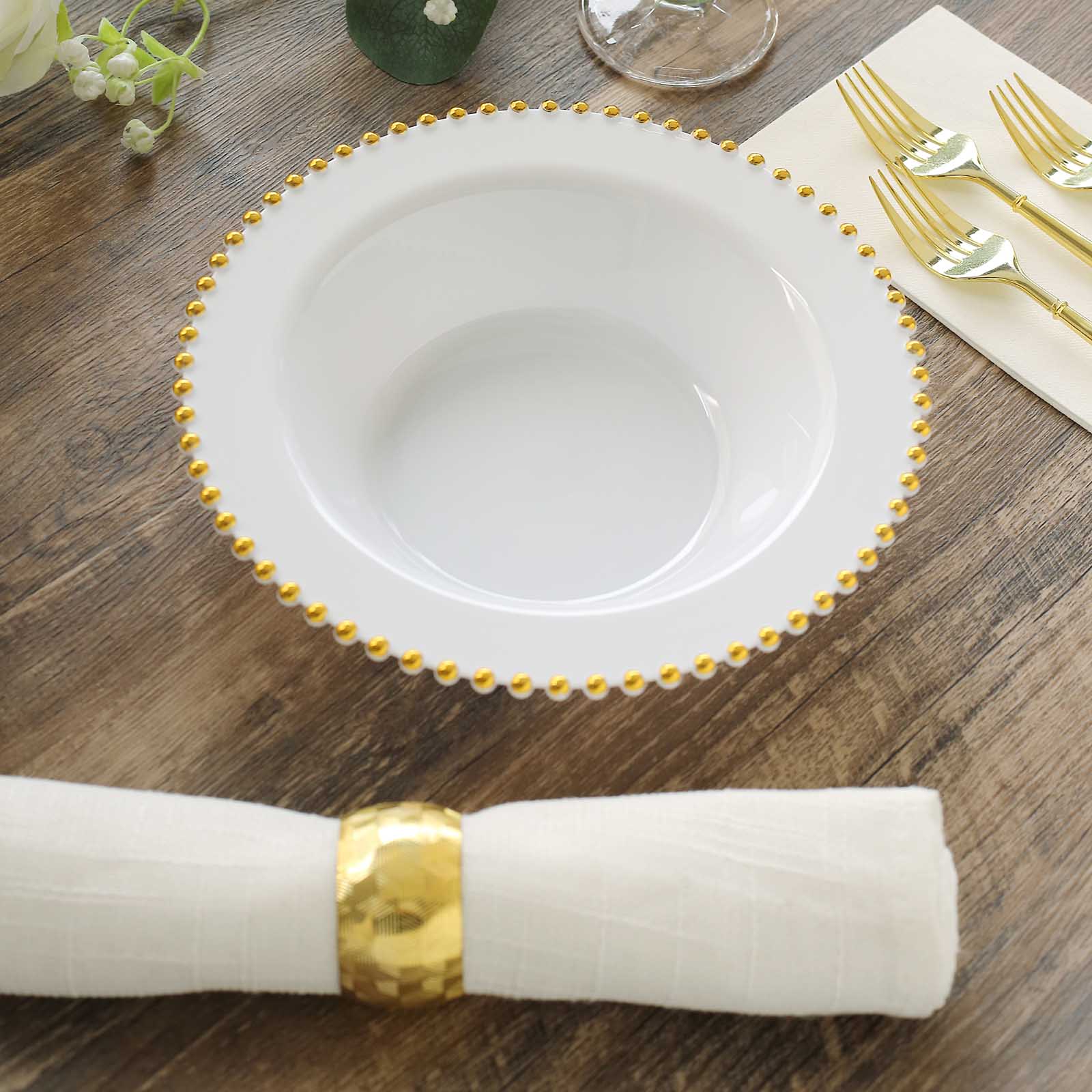 White round plastic dessert bowl with gold beaded rim.