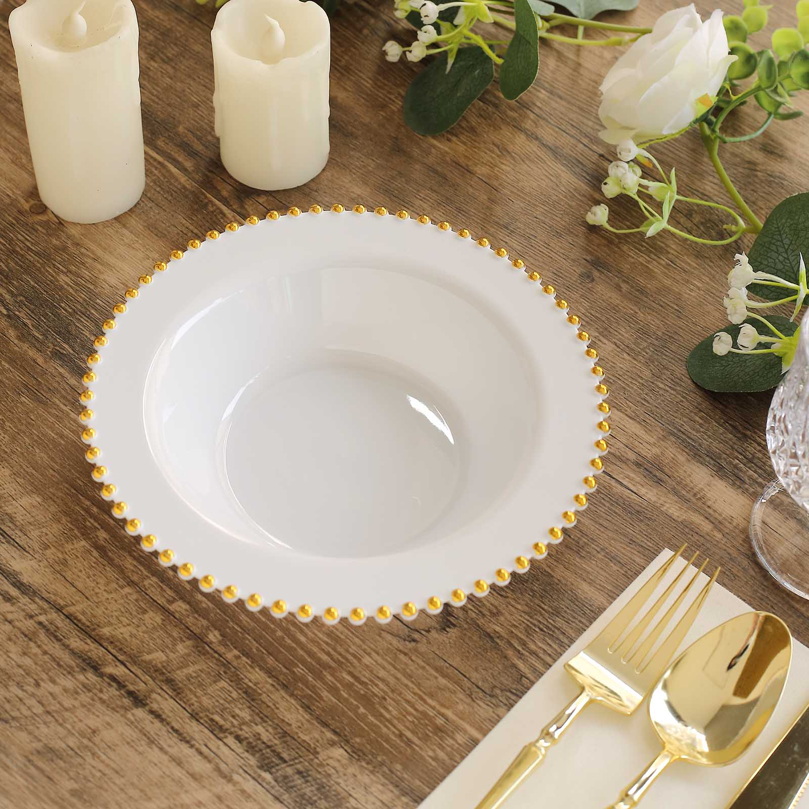 White round plastic dessert bowl with gold beaded rim.
