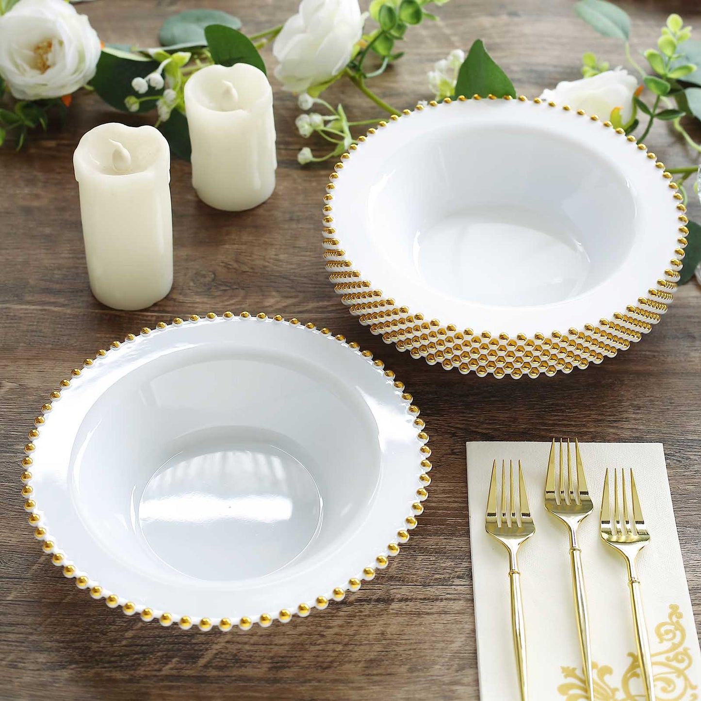 White round plastic dessert bowls with gold beaded rim.