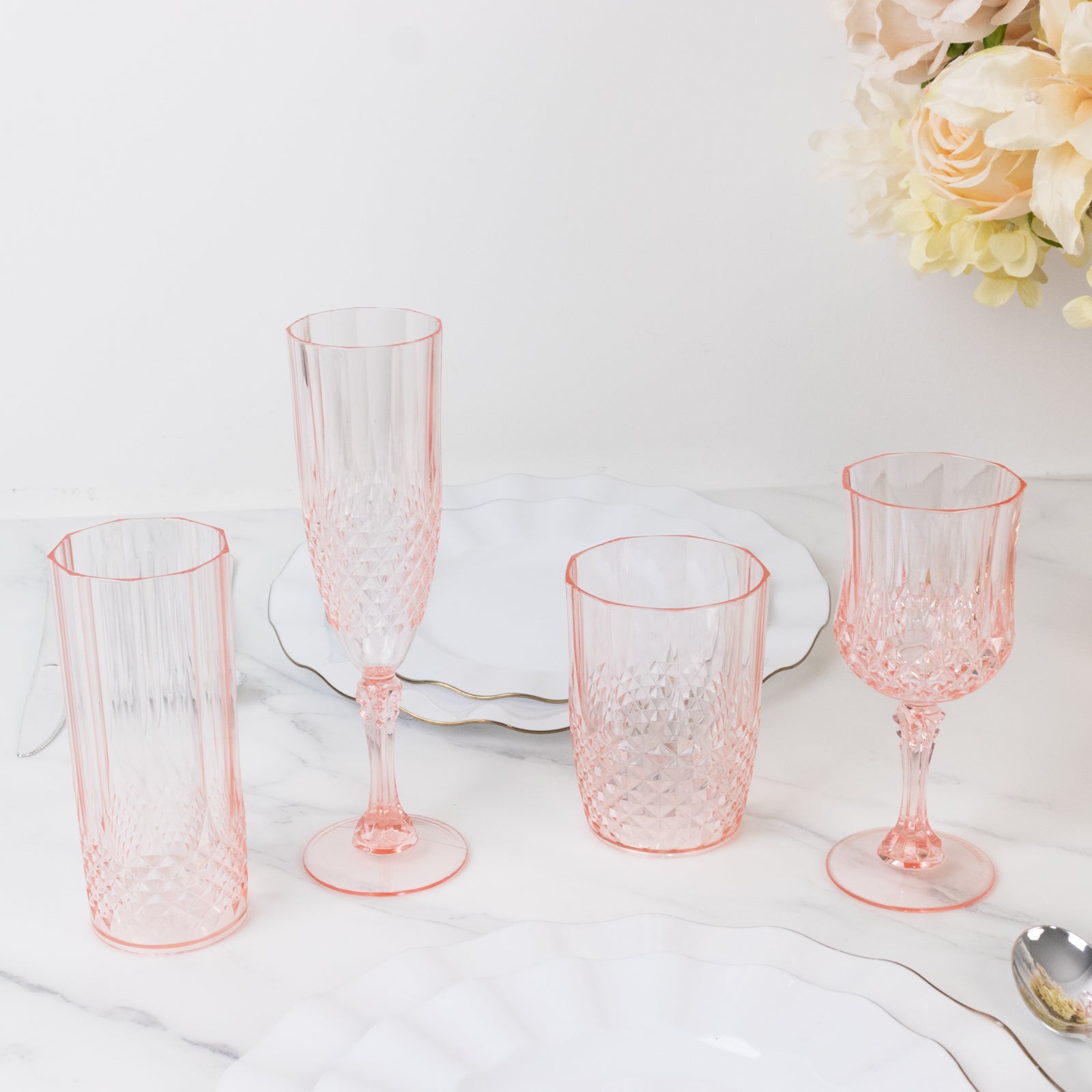 Transparent blush reusable plastic tumblers in crystal cut style, 16oz.