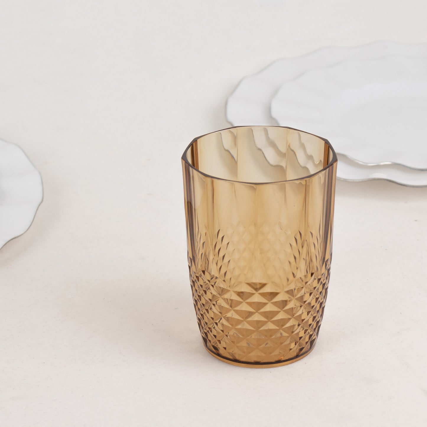 Amber gold reusable plastic tumbler glass, crystal cut style, 16oz.