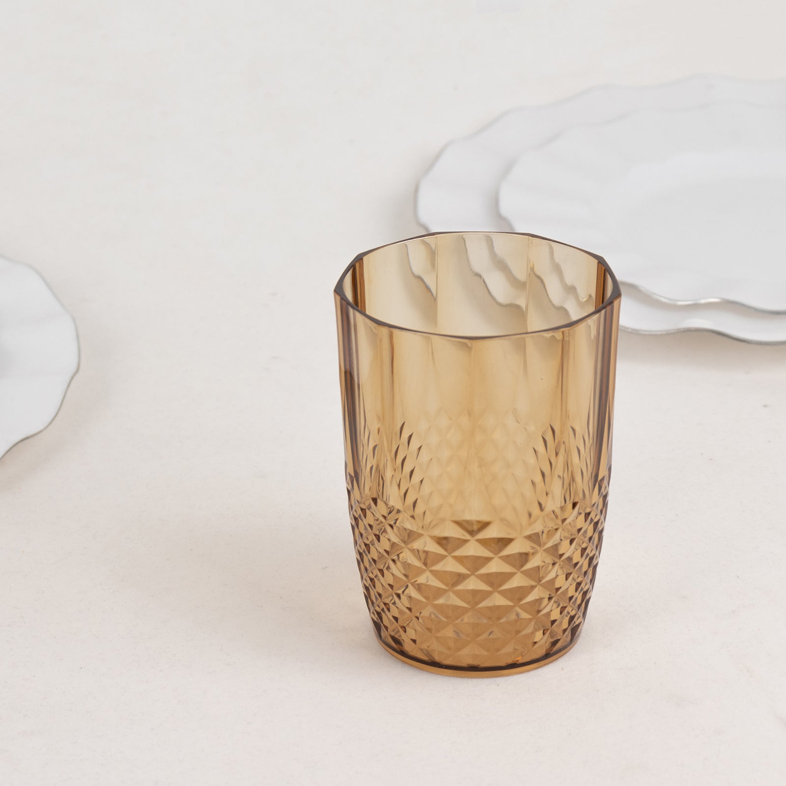 Amber gold reusable plastic tumbler glass, crystal cut style, 16oz.