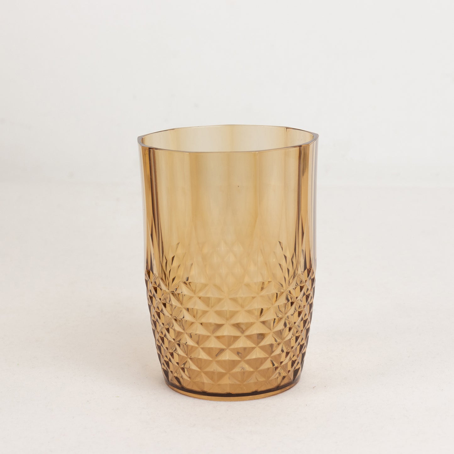Amber gold reusable plastic tumbler glass, 16oz, crystal cut style.
