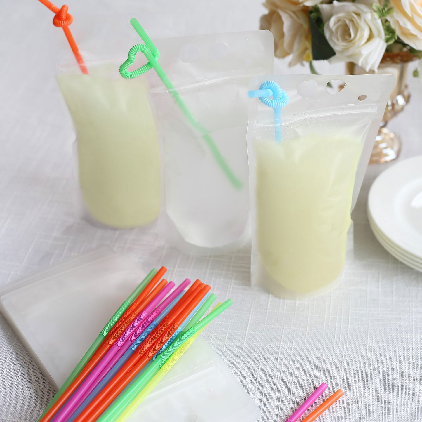 50 Pack Translucent Stand-Up Plastic Smoothie Drink Bags with Straws, 12oz Reusable Hand-Held Zipper Juice Pouches