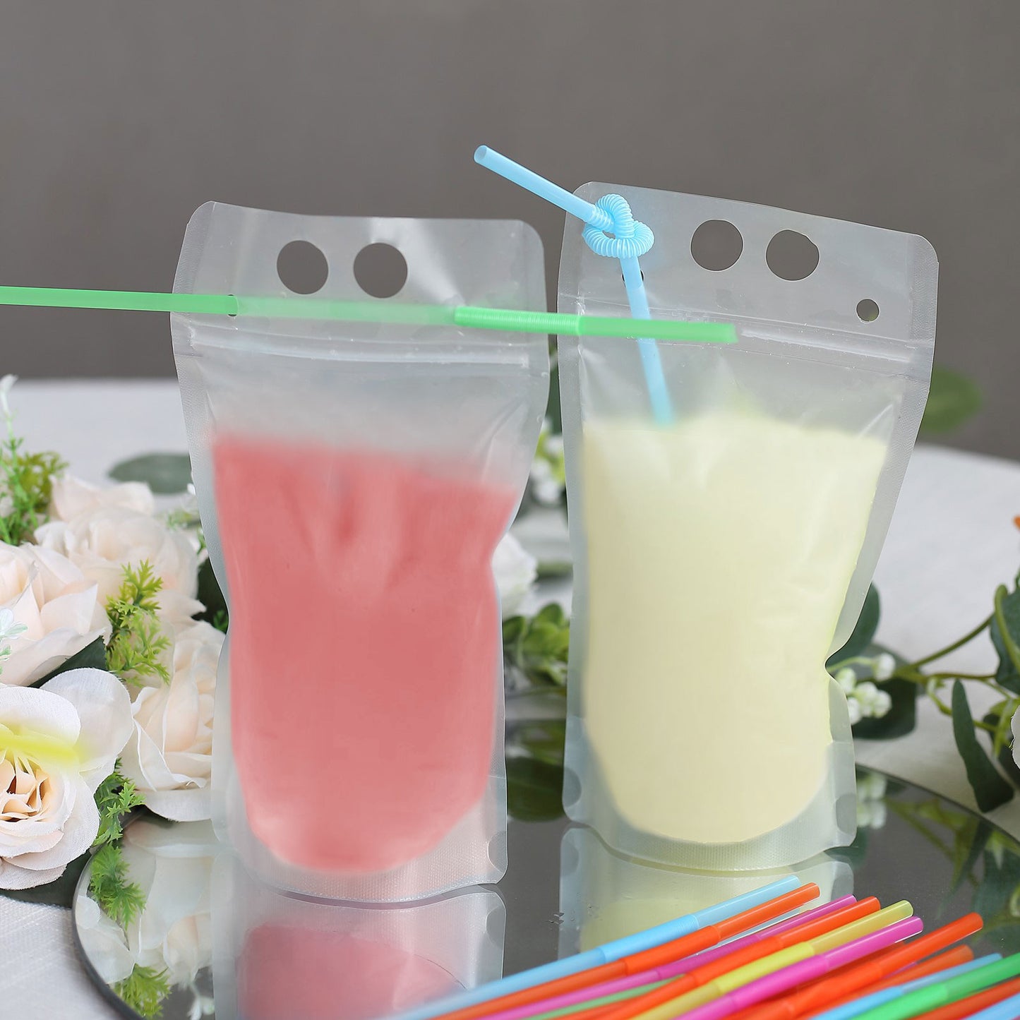50 Pack Translucent Stand-Up Plastic Smoothie Drink Bags with Straws, 12oz Reusable Hand-Held Zipper Juice Pouches