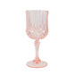 Transparent blush crystal cut reusable plastic cocktail goblet.