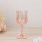 Transparent blush crystal cut reusable plastic cocktail goblet.