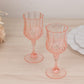 Transparent blush crystal cut reusable plastic cocktail goblets.