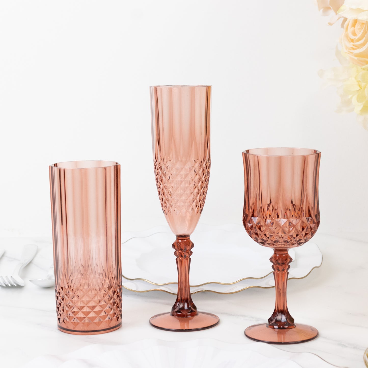 Dusty rose crystal cut reusable plastic cocktail goblets set.