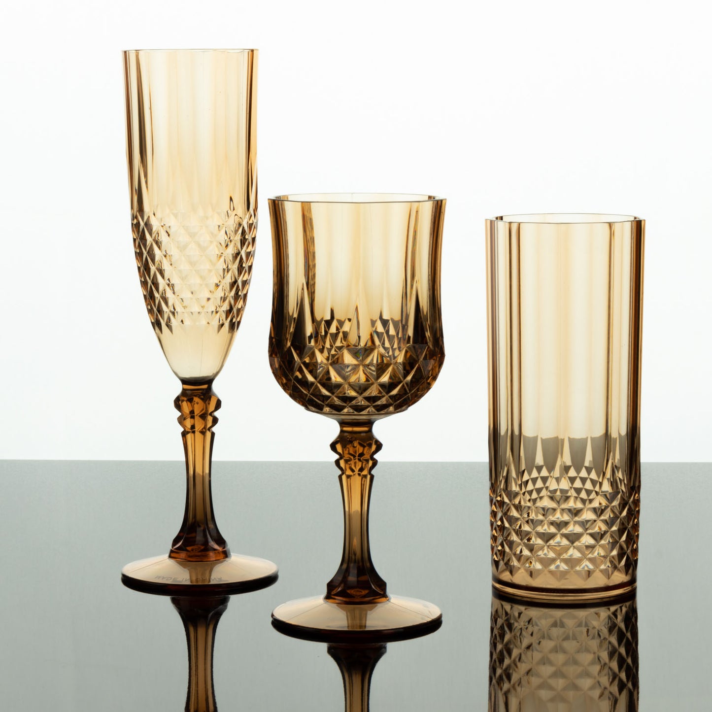 Amber gold shatterproof cocktail goblets, reusable plastic wine glasses.