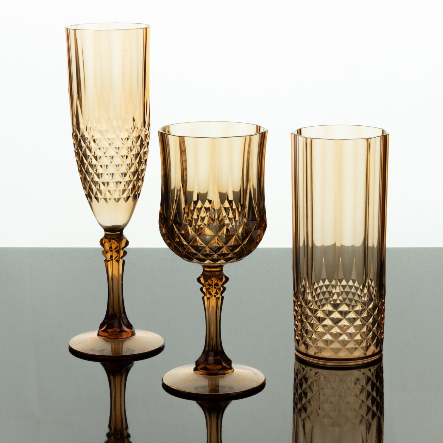 Amber crystal cut reusable cocktail goblets, shatterproof and elegant.