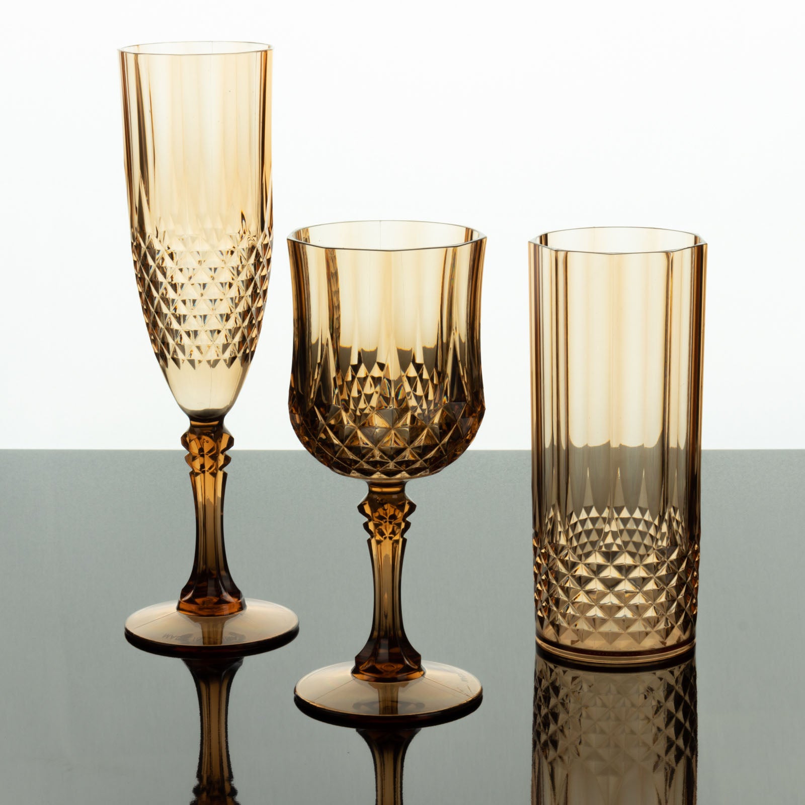 Amber crystal cut reusable cocktail goblets, shatterproof and elegant.