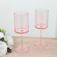 Transparent blush cocktail glasses with long stems, shatterproof design.