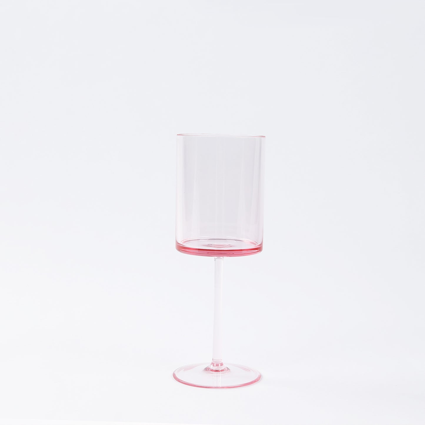 Transparent blush cocktail glass with long stem, 10oz shatterproof design.