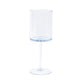 Transparent dusty blue reusable cocktail glass with long stem.