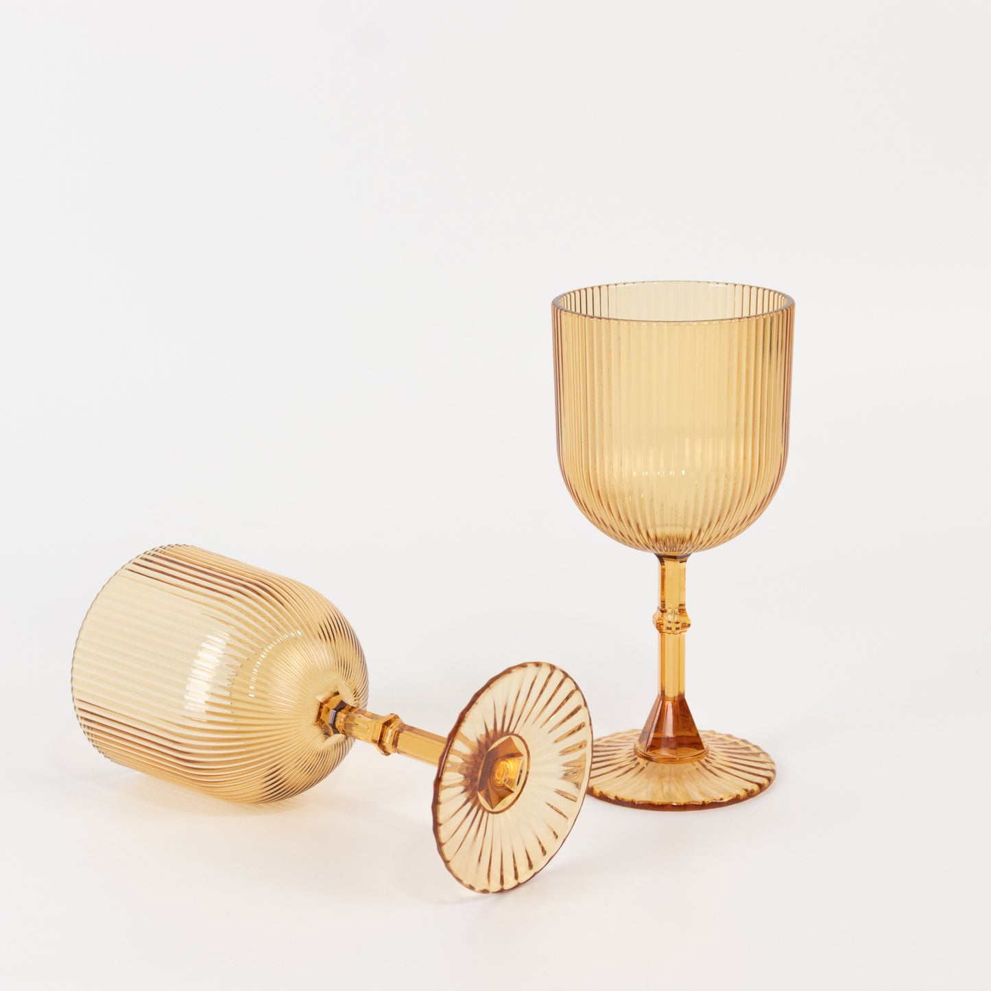Amber gold ribbed plastic wine goblets, shatterproof, vintage style.