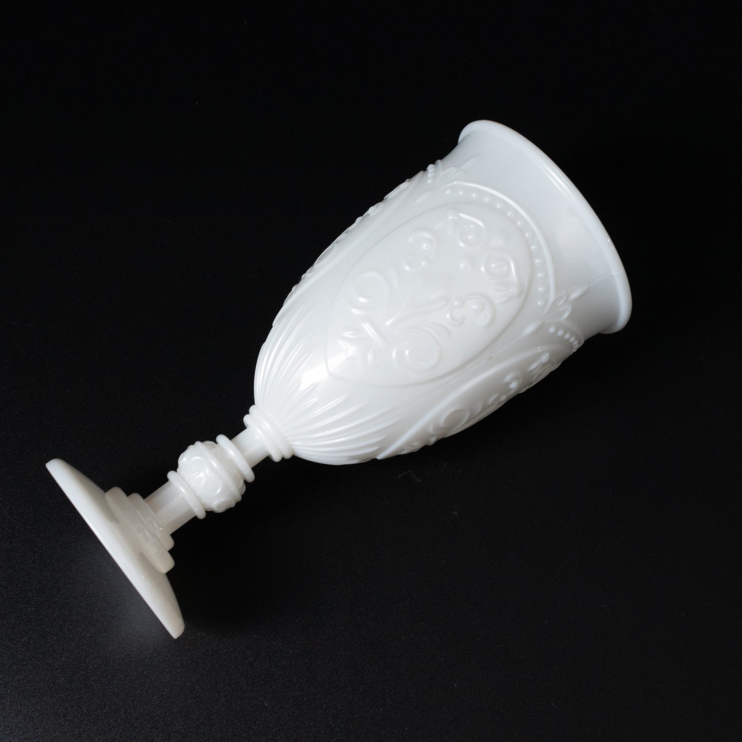 Pearl white vintage goblet with embossed design, 10oz capacity.