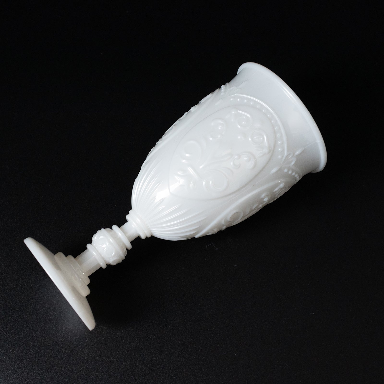Pearl white vintage goblet with embossed design, 10oz capacity.