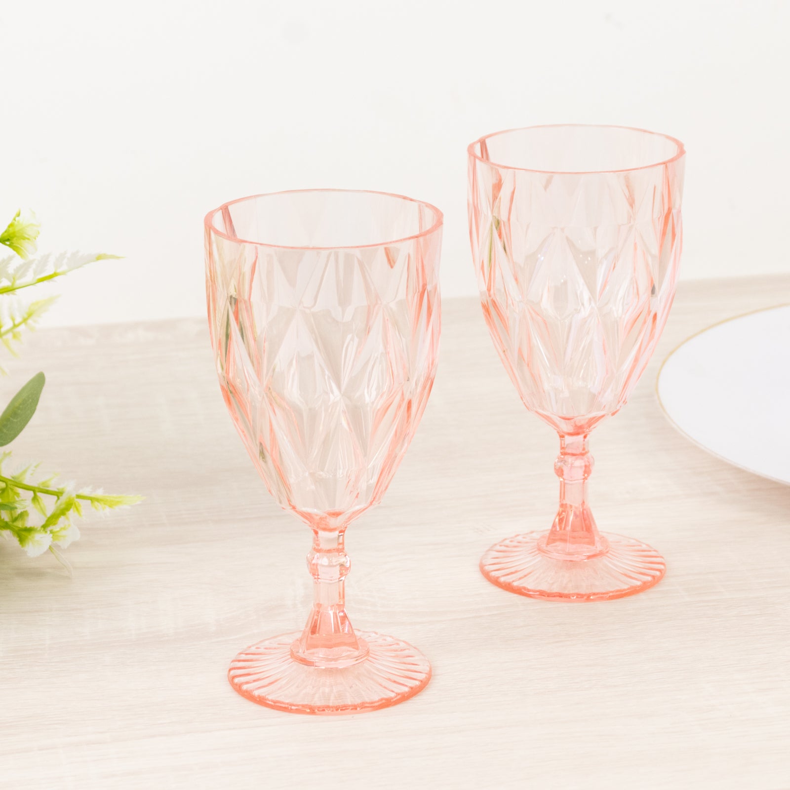 Blush vintage diamond cut plastic goblets for wine and beverages.