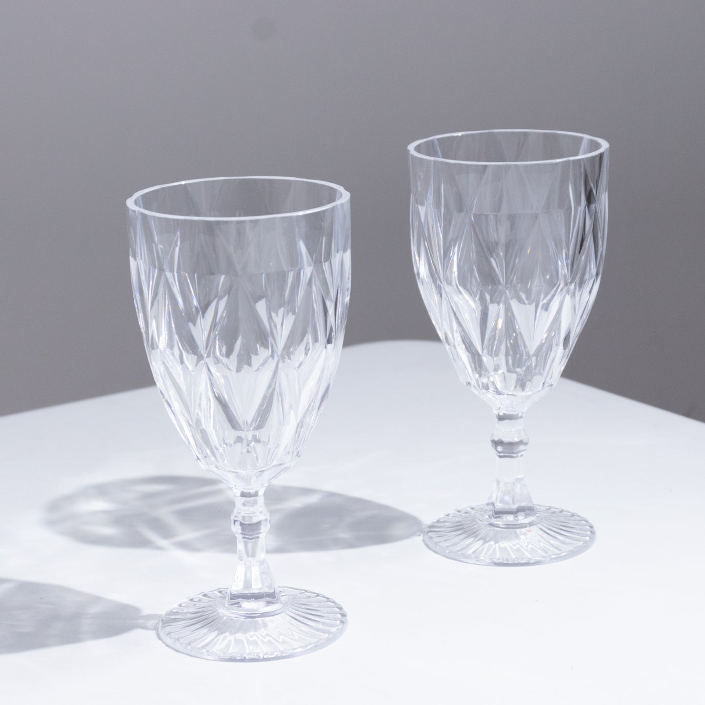 Clear vintage diamond cut plastic goblets, reusable wine and beverage glasses.