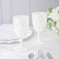 Pearl white vintage diamond cut plastic goblets on a table setting.