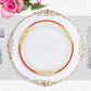 White dinner plate with red rim and gold vine design.