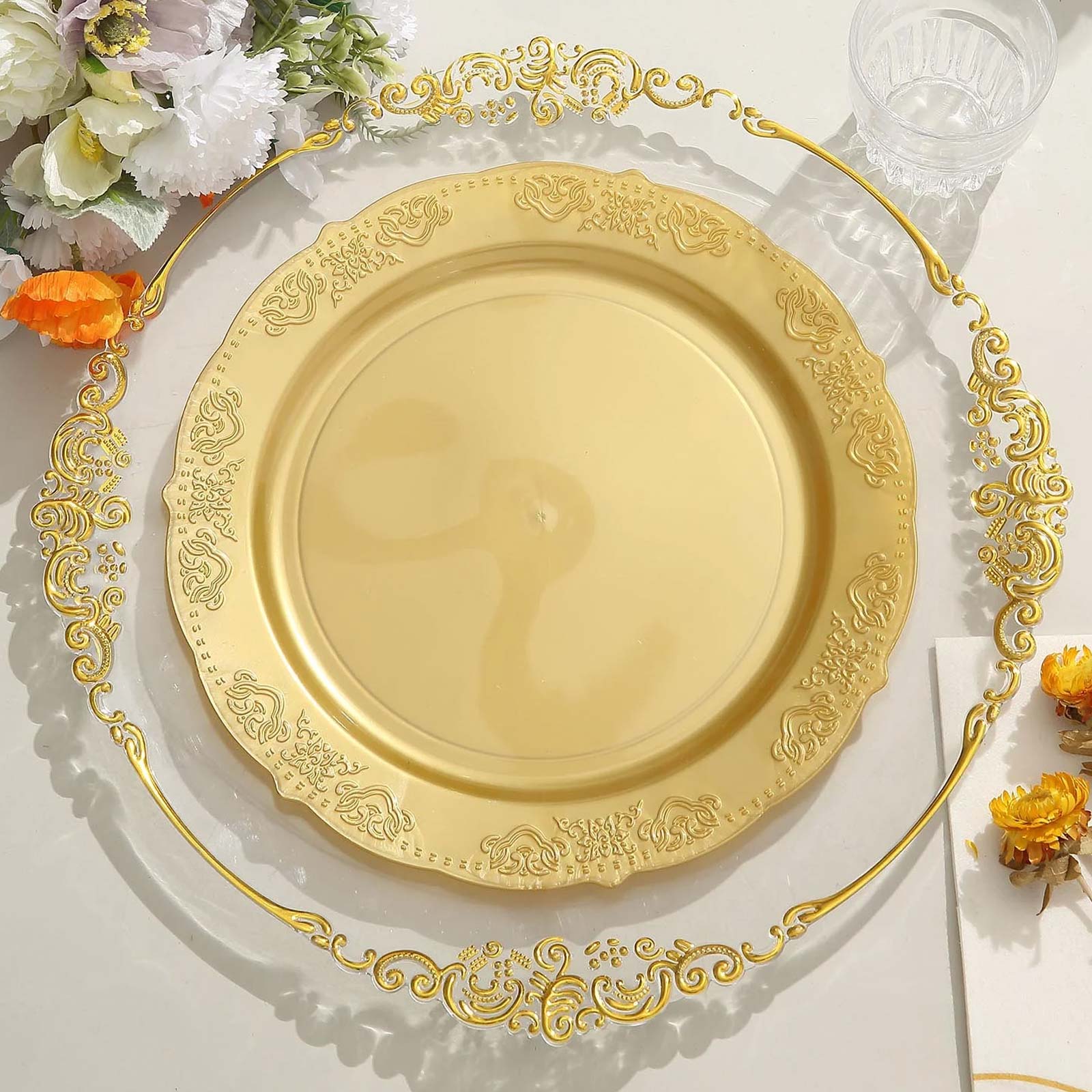 Gold embossed round dinner plate with scalloped edges, perfect for parties.