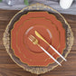 Rust terracotta dessert plates with gold rim on decorative platter.