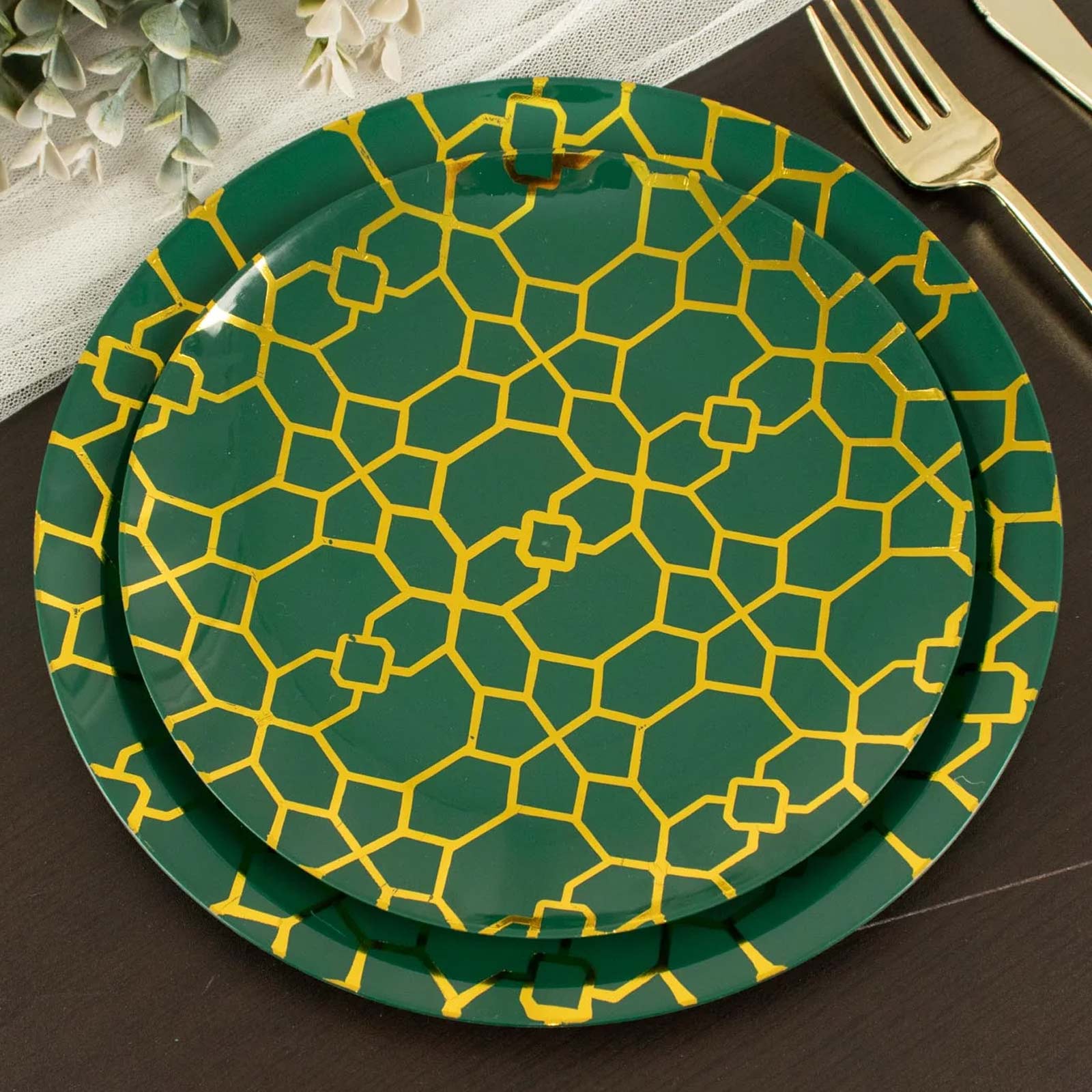 Emerald green geometric gold print disposable plates set.
