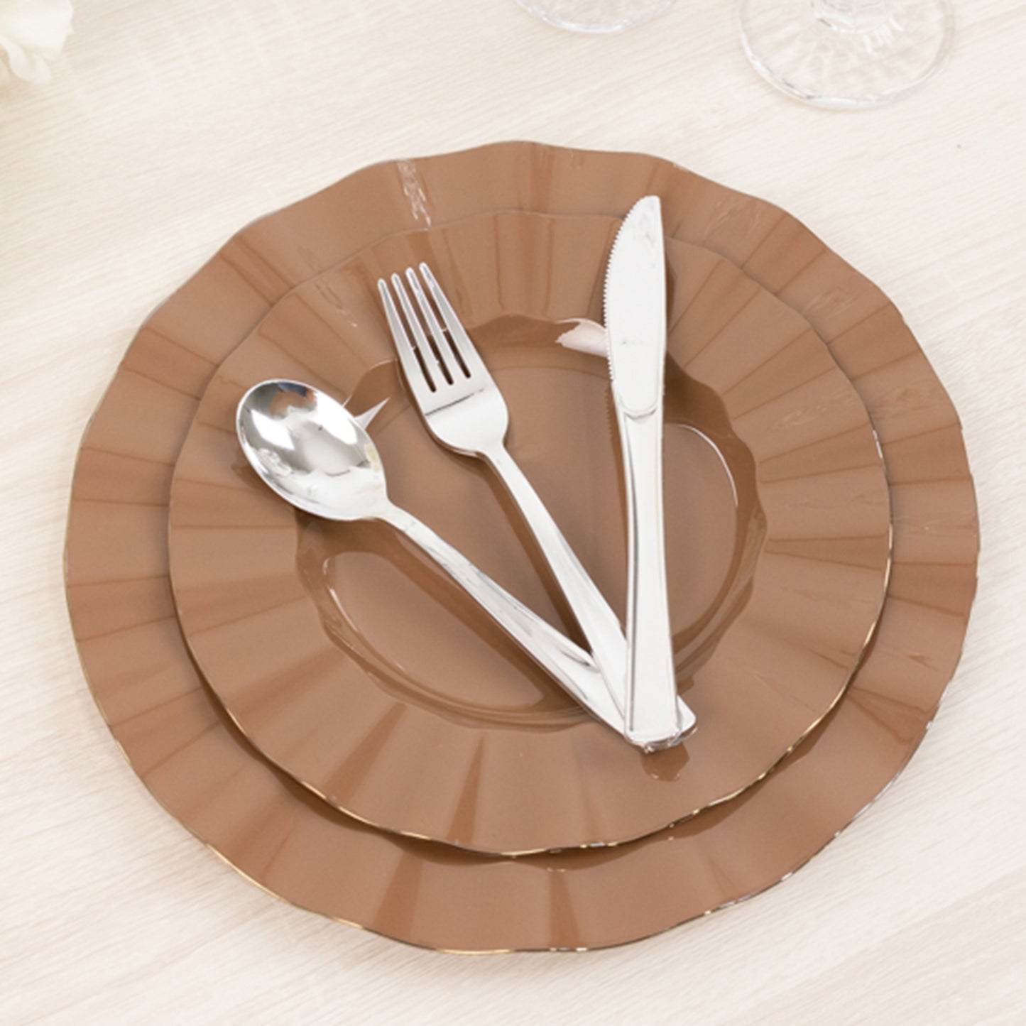 Coffee brown disposable dinner plates with gold ruffled rim.