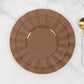 Coffee brown disposable dinner plates with gold ruffled rim.