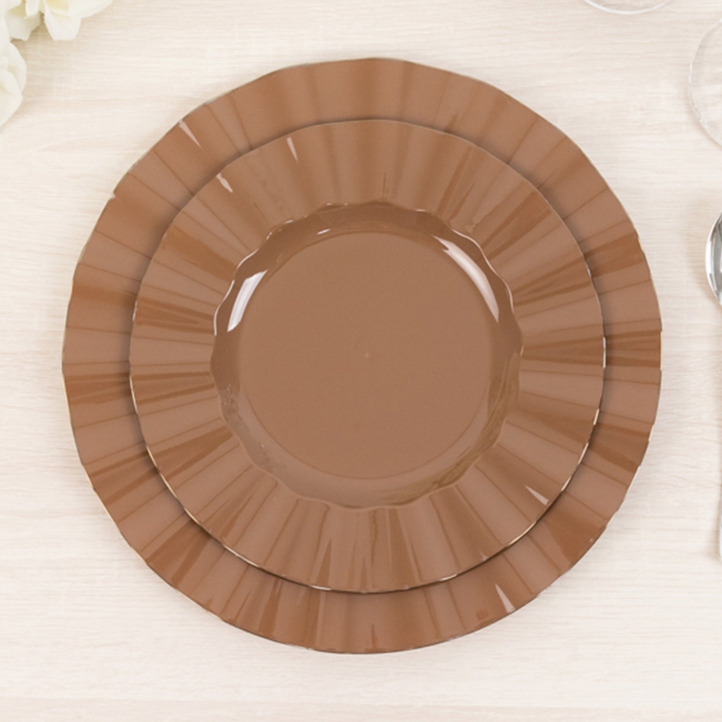 Coffee brown heavy duty disposable dinner plates with gold ruffled rim.
