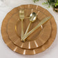 Gold heavy duty disposable dinner plates with ruffled rim and utensils.