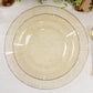 Gold glitter disposable dinner plates with ruffled rim, 9-inch size.