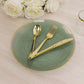 Dusty sage green swirl dinner plate with gold rim. Elegant party table setting.