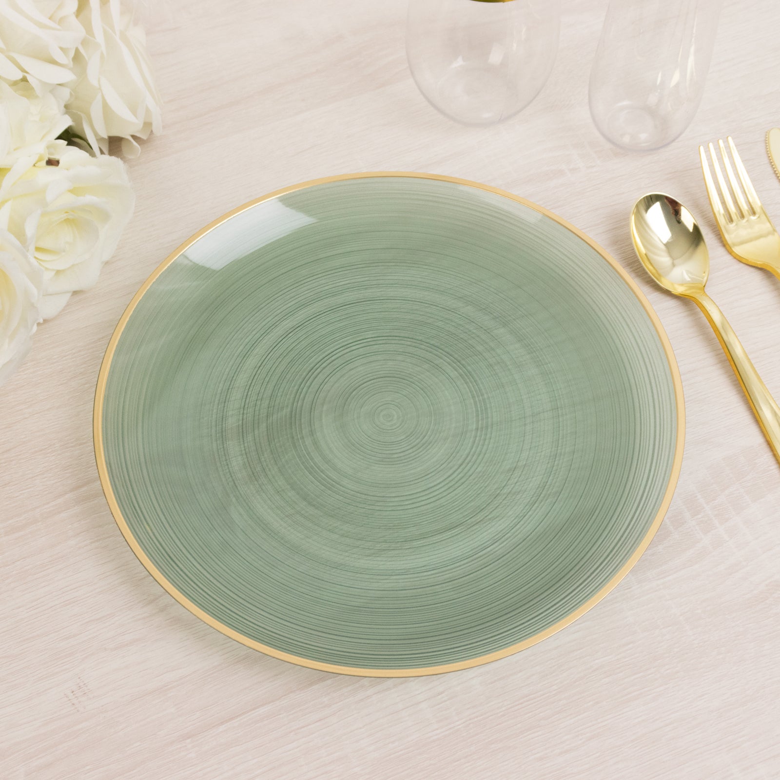 Dusty sage green swirl dinner plate with gold rim.