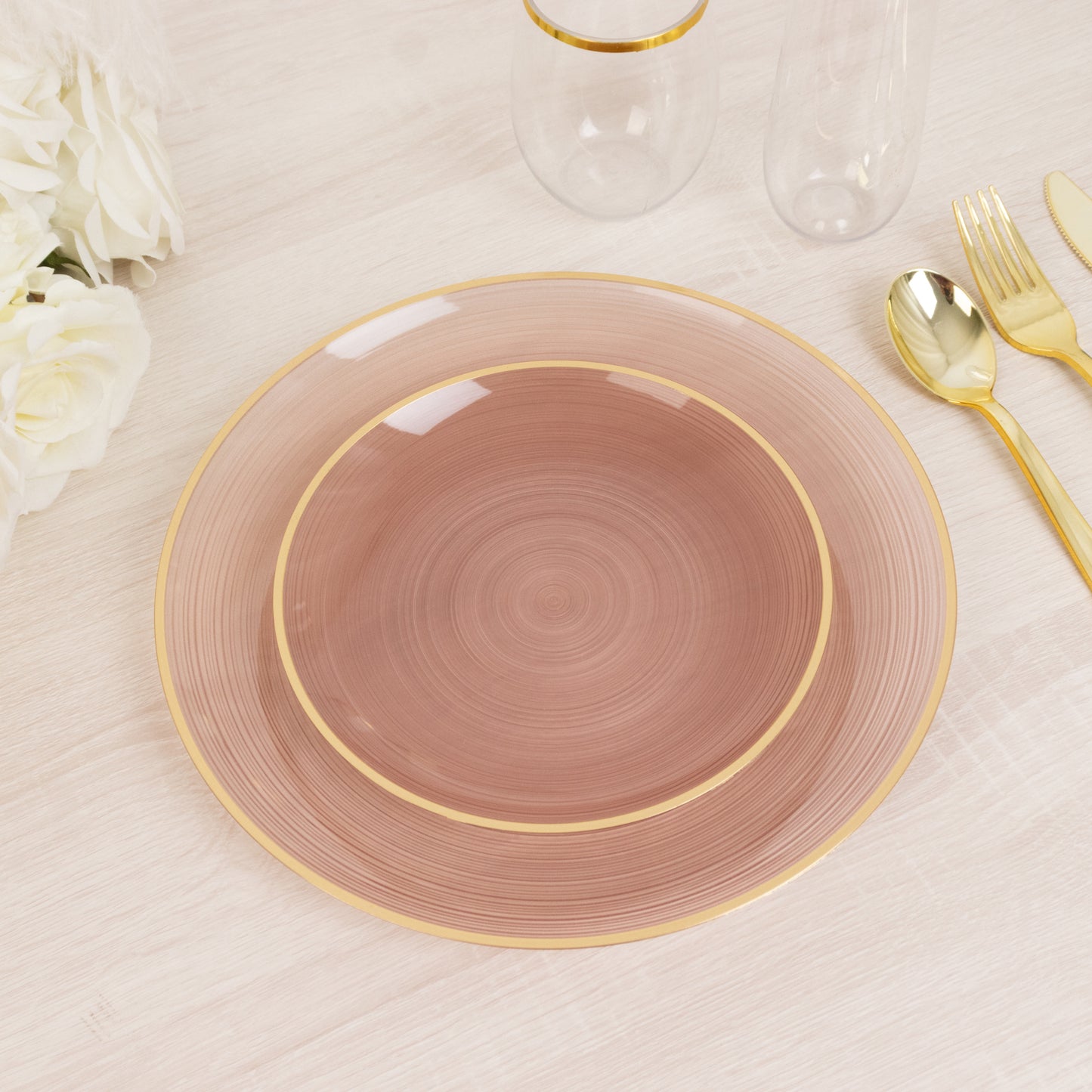 Dusty rose swirl plastic salad plate with gold rim, elegant party tableware.