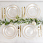 20-Pack 7" transparent pearl white swirl plates with gold rim for elegant parties.