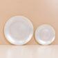 Transparent pearl white swirl plates with gold rim – elegant party dinnerware.