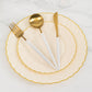 Ivory and gold flair rim disposable dessert plates stacked on a marble surface.