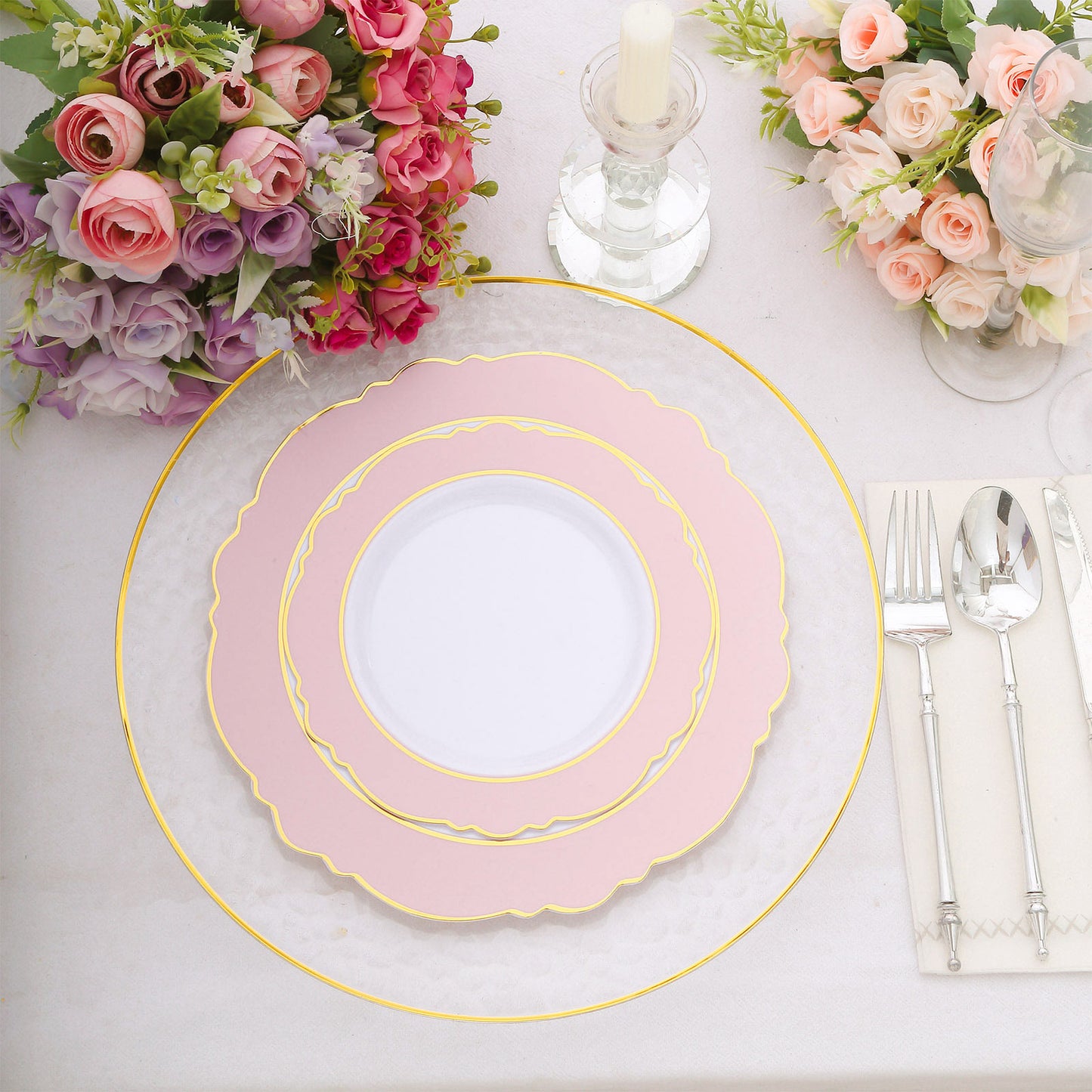 Blush white disposable dinner plates with gold rim and round blossom design.