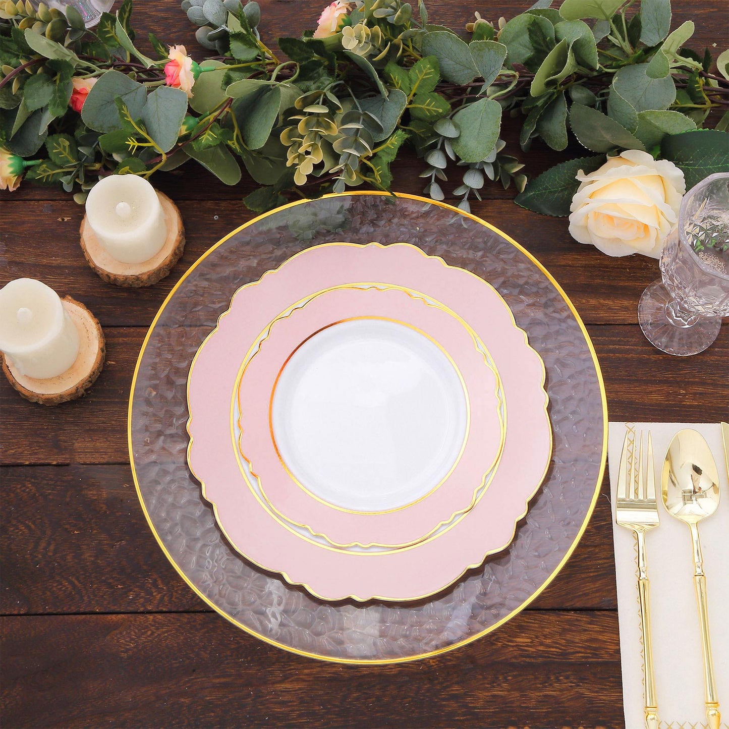 Blush white disposable salad plates with gold rim and round blossom design.
